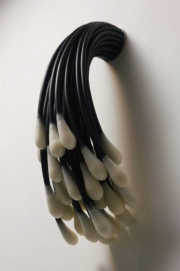 Animus 2011; 75cm x 27cm x 28cm; air compressor hose, wax, steel bracket Animus 2011; 75cm x 27cm x 28cm; air compressor hose, wax, steel bracket