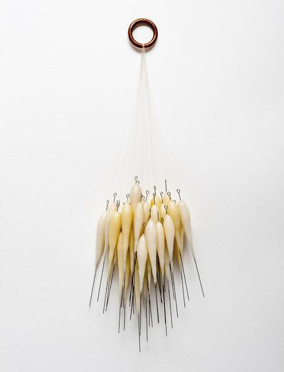 Harem 2013; 65cm x 25cm x 15cm; copper bull ring, violin bow hair, wax, steel pins Harem 2013; 65cm x 25cm x 15cm; copper bull ring, violin bow hair, wax, steel pins