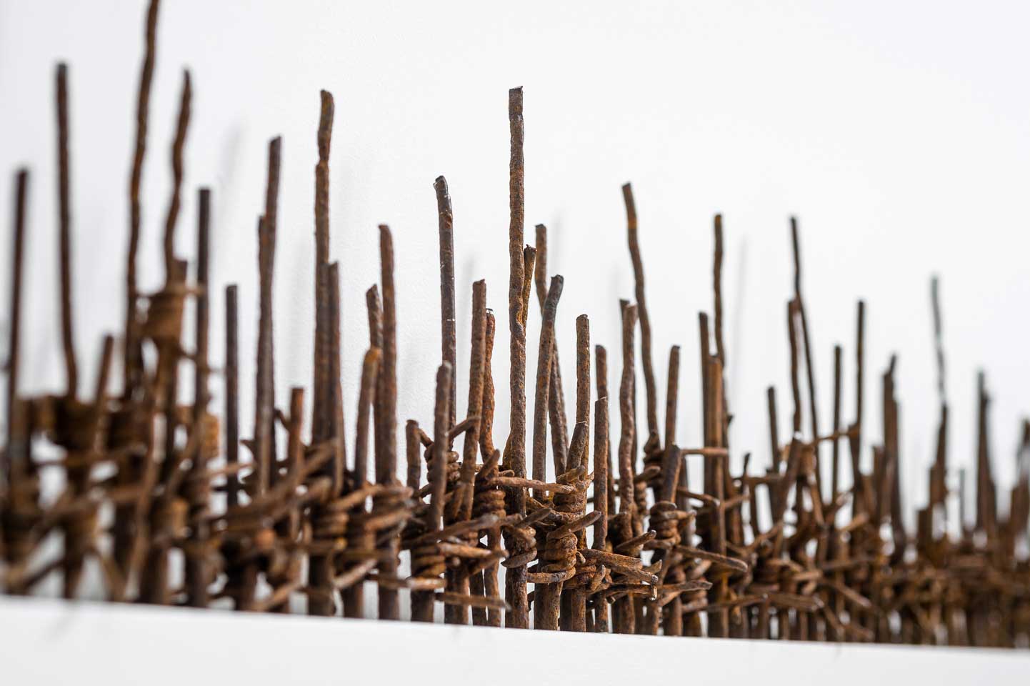 Hold the Line; reclaimed military barbed wire, painted MDF, wall mounted; 2016 Hold the Line; reclaimed military barbed wire, painted MDF, wall mounted; 2016