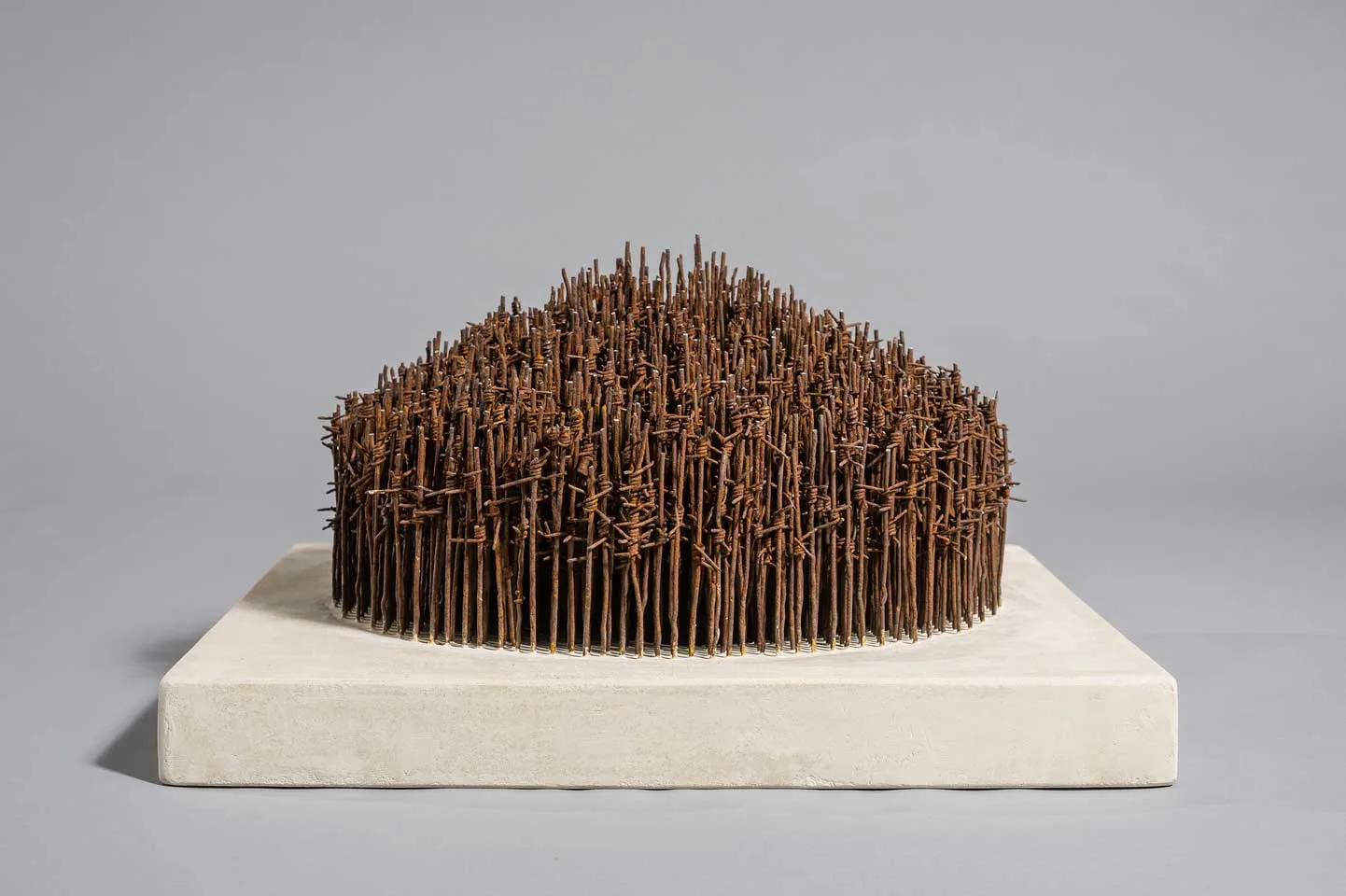 Palisade; reclaimed military barbed wire, composite portland stone; 2016 Palisade; reclaimed military barbed wire, composite portland stone; 2016