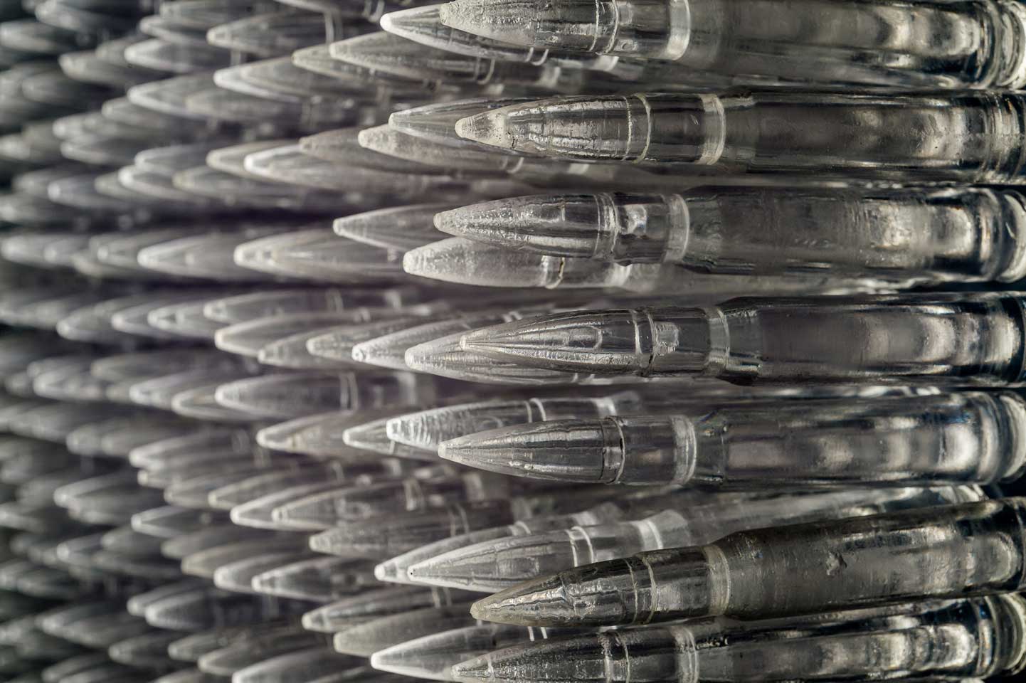 Pandora 2016; LED lightbox within doorframe; clear cast resin 50. cal Browning bullets Pandora 2016; LED lightbox within doorframe; clear cast resin 50. cal Browning bullets